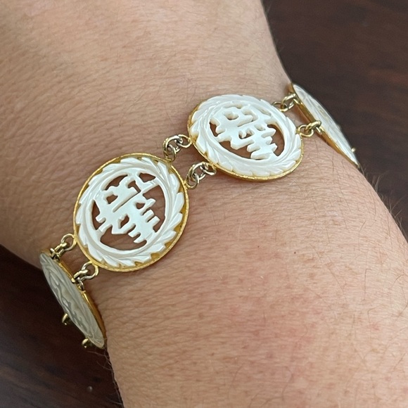 Vintage Jewelry - Carved antique style natural mother of pearl & gold tone metal bracelet